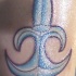 fleur de lis di cristallo tatuaggio
