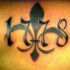 Le tatouage de fleur de lyse avec la date 1778