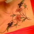 Flower and bird tattoo