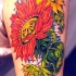 Tatuaje de girasoles color rojo y amarillo