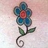minimalistico fiore blu tatuaggio