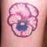 Tatuaje de flor color rosa