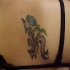 fiore come monogramma tatuaggio