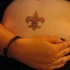giallo fleur de lis tatuaggio