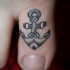 Ancora tatuata sul alluce
