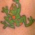 Le tatouage de grenouille vert et orange