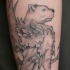 Grifone con testa di orso tatuaggio