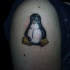 Pinguino logo tatuaggio colorato