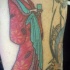 Geisha fille le tatouage sur le bras