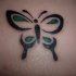 Farfalla nera tatuaggio
