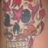 Cranio con fiori tatuaggio