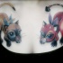Tatouage sur la poitrine de chats bon et méchant