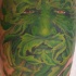 Pittoresco tatuaggio sulla gamba silvano verde (spirito del bosco)