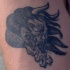 Bestia asiatica sfita la fiamma tatuaggio