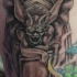 Gargoyle sorridendo tatuaggio