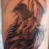 La Faucheuse le tatouage sur le bras