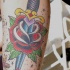 rosa accoltellata con pugnale tatuaggio in colore