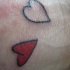 Due cuori tatuaggio sul polso