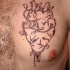 Cuore trasparente tatuaggio sul petto