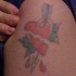 Le tatouage de cœur brisé avec une flèche
