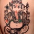 tatuaje de la deidad de Ganesha bebiendo