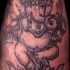 tatuaje en tinta negra de Ganesha bailando