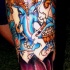 tatuaje colorido en el antebrazo de la deidad de  ganesha indú