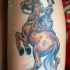 tatuaje de señora en el caballo