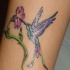 Le tatouage de colibri majestueuse pourpre