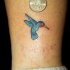 Le tatouage de minuscule colibri classique