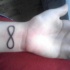 simbolo infinito sul polso tatuaggio