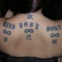Tatuaje de 3 símbolos del infinito y jeroglificos chinos