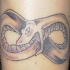 simbolo infinito come serpente tatuaggio