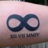 simbolo di infinita' con le dati tatuaggio