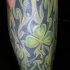 Tatuaje del trébol verde en el fuego