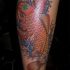 Tatuaje de una carpa koi en el mar
