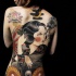 Tatuaje elegante para toda espalda de una geisha japonesa