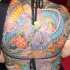 Tatuaje multicolor muy detallado de una geisha y un dragón