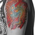 demonio giapponese colorato sulla spalla tatuaggio