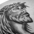 gesu' in croce di spine inchiostro nero tatuaggio