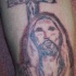 gesu' e croce di legno tatuaggio