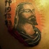 testa gesu con simboli cinesi tatuaggio
