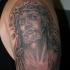 gesu' in dolore inchiostro nero tatuaggio