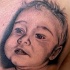 piccolo bimbo tatuaggio su base di foto