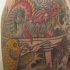 Le tatouage de koї jaune avec un dragon rouge