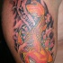 ELEGANTE FEMMINILE KOI PESCE TATUAGGIO