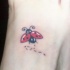 Le tatouage de vol de la coccinelle