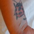 Le tatouage de gros coccinelle sur le poignet