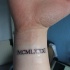 Tatuaje de una fecha de numeros romanos