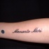 Un petit tatouage de locution latin memento mori